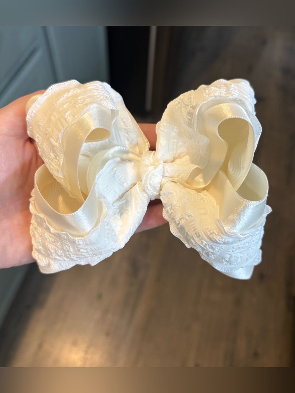 Cream Ruffle and Satin Bow